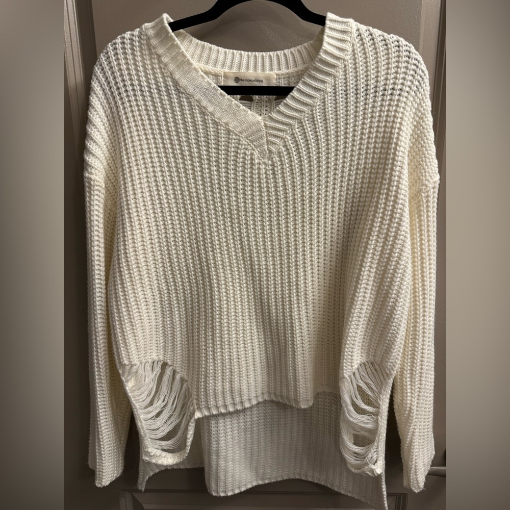 Boutique brand ivory rip sweater
